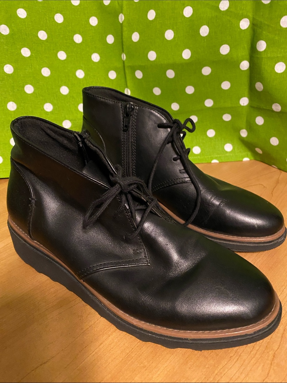 Clarks women’s Black Leather Chukka Boots with Tan Accent